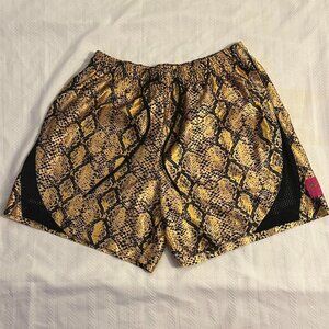 Nike snake print mesh shorts in black and gold
